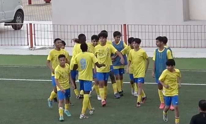 Cristiano Ronaldo Jr pictured (center) celebrating with his teammates after scoring for Al Nassr in a 4-1 win over Ohod in the Saudi U13 Premier League in February 2024